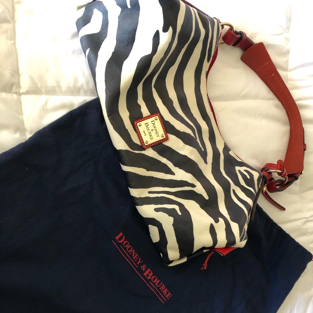 Dooney & Bourke Zebra Print handbag with Red Trim - Picture 2 of 10